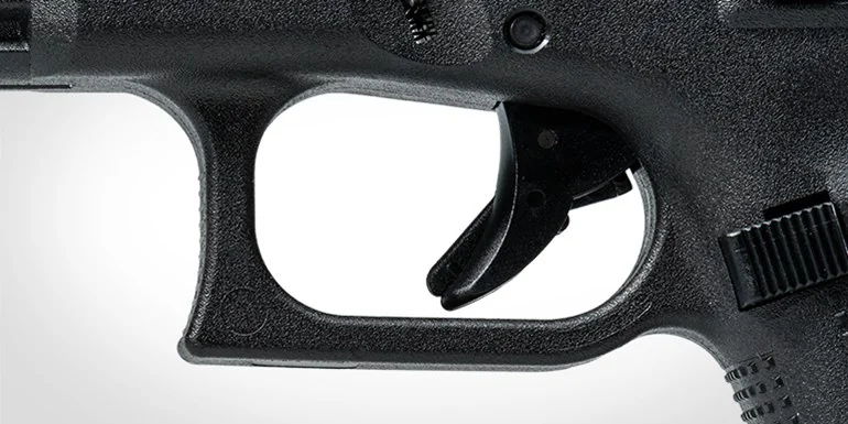 Предохранительный рычаг в спусковом крючке Glock